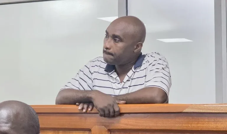 Kabale Teacher convicted of child trafficking, rape, and defilement. Junior Tukasibwe in court.webp
